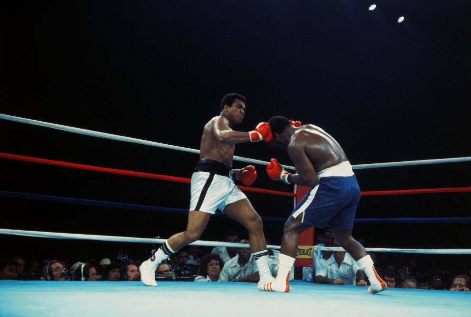 10/1/1975- Manila, The Philippines:  Champion Muhammad Ali (white trunks) lands a right on Joe Frazier's head during the 2nd round.  Ali held his title 10/1 defeating Frazier by TKO in the 14th round.