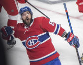 Montreal Canadiens' Mathieu Perreault reacts after scoring against the Detroit Red Wings during the second period of an NHL hockey game Saturday, Oct. 23, 2021, in Montreal. (Graham Hughes/The Canadian Press via AP)