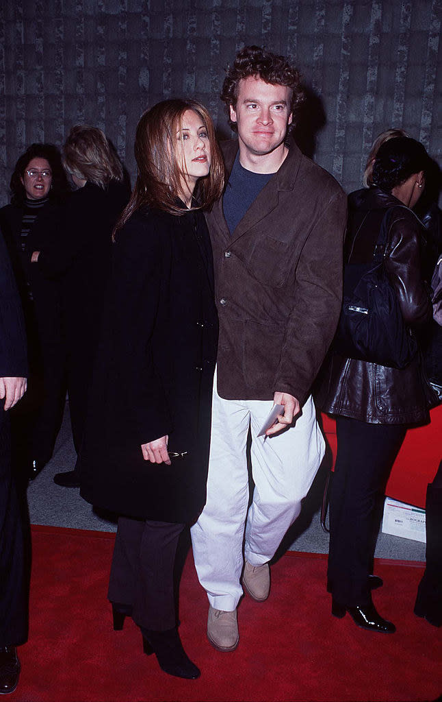 Jennifer Aniston and Tate Donovan arriving at the Scream world premiere red carpet