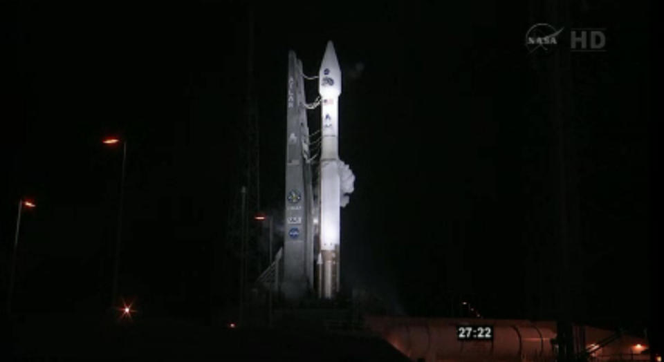 This framegrab image provided by NASA-TV shows the Atlas V first stage and Centaur upper stage sitting on the launch pad at Cape Canaveral Air Force Station, Florida just prior to launch early Thursday Aug. 30, 2012. The planned launch is scheduled for 4:05 a.m. EDT Thursday of NASA’s Radiation Belt Storm Probes. The RBSP is pair of identical spacecraft loaded with scienitific instruments which will follow each other through the Van Allen radiation belts around the Earth to gain unprecedented knowledge about the region. (AP Photo/NASA)