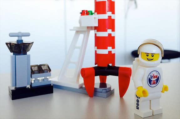 Danish astronaut Andreas Mogensen is flying to the International Space Station with LEGO minifigures emblazoned with his "iriss" mission logos in support of educational outreach projects.