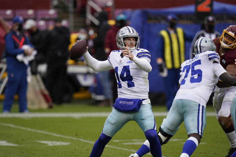 Dallas Cowboys quarterback Andy Dalton (14) passing the ball against Washington Football Team in the first half of an NFL football game, Sunday, Oct. 25, 2020, in Landover, Md. (AP Photo/Patrick Semansky)