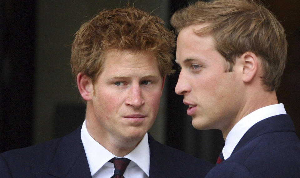 FILE - Princes William and Harry, left, leave the Service of Thanksgiving for the life of Diana, Princess of Wales, at the Guards' Chapel, London, Aug. 31, 2007. Prince Harry’s explosive memoir, with its damning allegations of a toxic relationship between the monarchy and the press, is likely to accelerate the pace of change already under way within the House of Windsor following the death of Queen Elizabeth II. (AP Photo/Lewis Whyld, Pool)