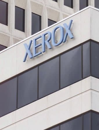 The Xerox Corporation office building is shown in McLean, Virginia in this June 28, 2002 file photo. Xerox Corp, best known for its printers and copiers, reported a slightly better-than-expected quarterly profit as expenses declined 4 percent. REUTERS/Hyungwon Kang/Files (UNITED STATES - Tags: BUSINESS)
