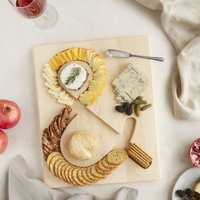 <p><a href="https://go.redirectingat.com?id=74968X1596630&url=https%3A%2F%2Fwww.uncommongoods.com%2Fproduct%2Fcheese-crackers-serving-board&sref=https%3A%2F%2Fwww.cosmopolitan.com%2Flifestyle%2Fg4447%2Fincredible-secret-santa-gifts%2F" rel="nofollow noopener" target="_blank" data-ylk="slk:Shop Now;elm:context_link;itc:0;sec:content-canvas" class="link ">Shop Now</a></p><p>Cheese and Crackers Serving Board</p><p>uncommongoods.com</p><p>$48.00</p><span class="copyright">Uncommon Goods</span>