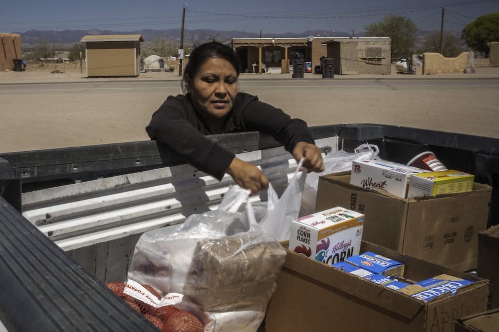 Lynette Quintana loads her truck with food distributed through the FDPIR program from the food distribution warehouse of the Five Sandoval Indian Pueblos in Bernalillo, New Mexico.  (Photo: Bob Nichols, USDA | Public Domain)
