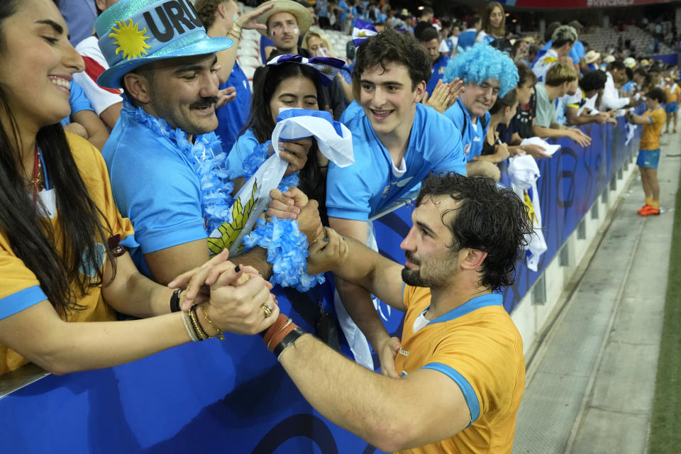 Uruguay's Manuel Ardao greets supporters at the end of the Rugby World Cup Pool A match between Italy and Uruguay at the Stade de Nice, in Nice, Wednesday, Sept. 20, 2023. (AP Photo/Pavel Golovkin)