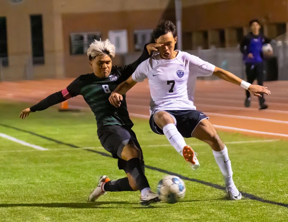 Connally Cougars Mauricio Orozco (8) kicks the ball away from Georgetown Eagles forward Martin Valdes (7) during the second half at the District 23-5A boys soccer game on Feb 16, 2024, at Connally High School in Pflugerville, TX.
