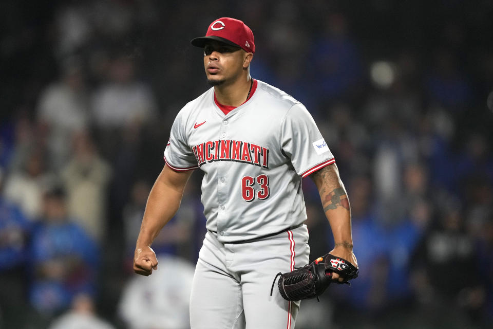 Cincinnati Reds pitcher Fernando Cruz reacts after striking out Chicago Cubs' Christopher Morel to end the seventh inning of a baseball game Saturday, June 1, 2024, in Chicago. (AP Photo/Charles Rex Arbogast)