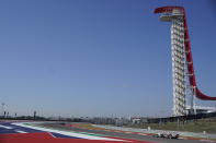 Jessica Hawkins, Britain, drives past an observation tower during a practice session for the W Series auto race at Circuit of the Americas, Friday, Oct. 22, 2021, in Austin, Texas. (AP Photo/Darron Cummings)