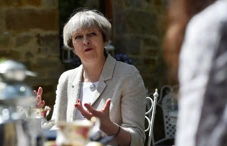 Britain's Prime Minister Theresa May speaks during an election campaign visit to Horsfields Nursery in Silkstone, South Yorkshire, Britain, June 3, 2017. REUTERS/Hannah McKay