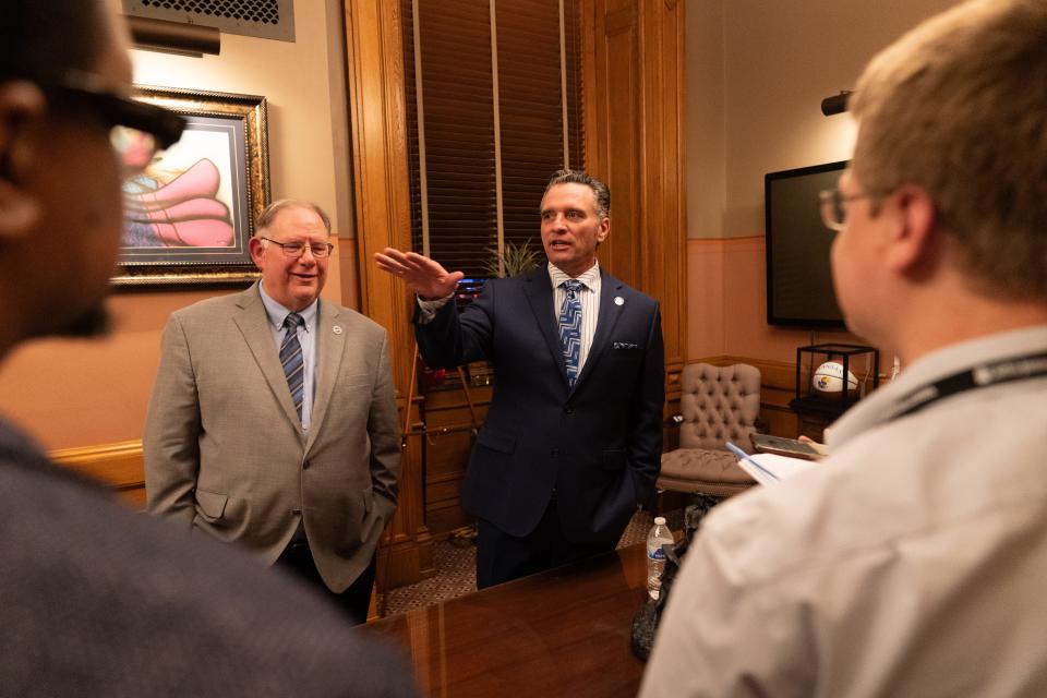 Speaker of the House Dan Hawkins, R-Wichita, left, and Senate President Ty Masterson, R-Andover, respond Wednesday after Gov. Laura Kelly's State of the State address.