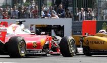 Belgium Formula One - F1 - Belgian Grand Prix 2016 - Francorchamps, Belgium - 28/08/16 - Ferrari's Kimi Raikkonen of Finland crashes at the start of the Belgian F1 Grand Prix. REUTERS/Yves Herman