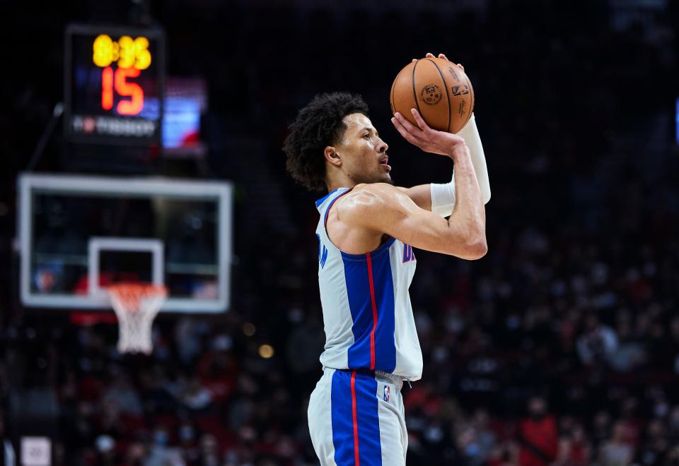 Detroit Pistons guard Cade Cunningham shoots a 3-point basket against the Portland Trail Blazers during the first half of an NBA basketball game in Portland, Ore., Tuesday, Nov. 30, 2021.