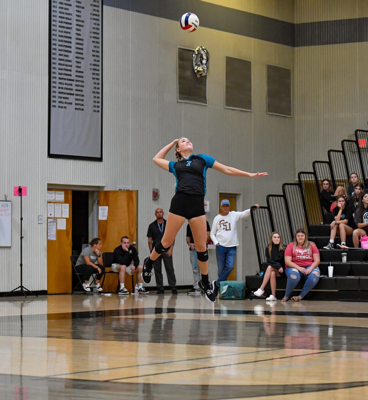 Jensen Beach’s Catherine Hamilton (7) serves in the Region 4-5A championship match, Wednesday, Nov. 1,2023.