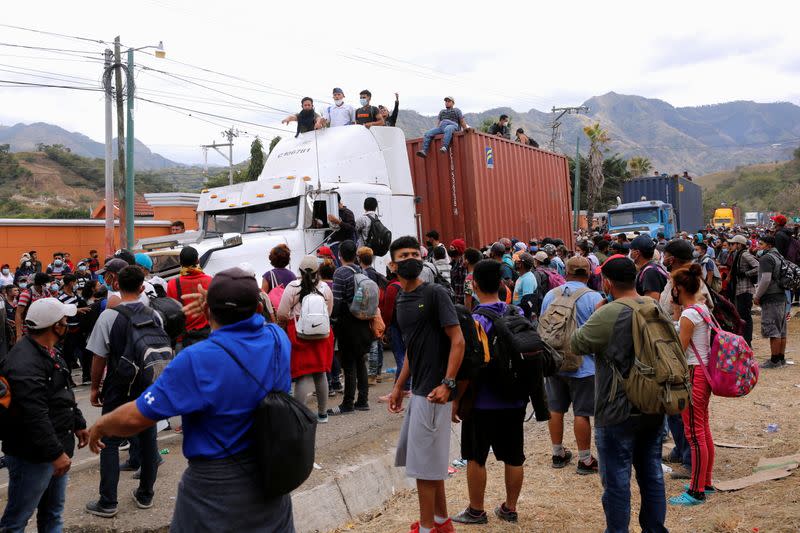 Hondurans take part in a new caravan of migrants, set to head to the United States, in Vado Hondo