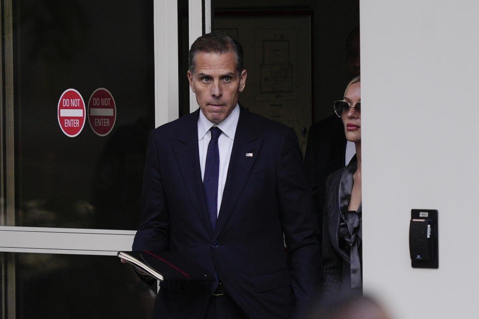 Hunter Biden, left, accompanied by his wife, Melissa Cohen Biden, depart from federal court, Monday, June 3, 2024, in Wilmington, Del. (AP Photo/Matt Rourke)