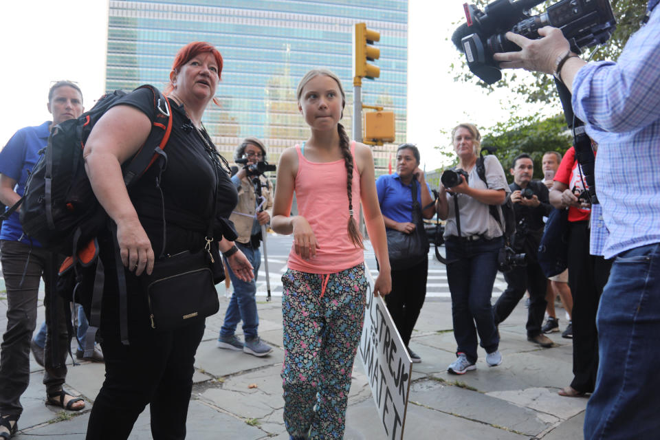 Swedish environmental activist Greta Thunberg arrives for a Youth Climate Strike outside the United Nations, Friday, Aug. 30, 2019. Thunberg is scheduled to address the United Nations Climate Action Summit on September 23. (AP Photo/Bebeto Matthews)