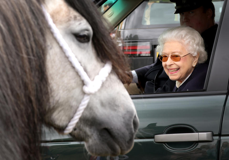 WINDSOR, ENGLAND - MAY 13: Queen Elizabeth II watches the horses from her Range Rover at The Royal Windsor Horse Show at Home Park on May 13, 2022 in Windsor, England. The Royal Windsor Horse Show, which is said to be the Queen’s favourite annual event, takes place as Her Majesty celebrates 70 years of service. The 4-day event will include the “Gallop Through History” performance, which forms part of the official Platinum Jubilee celebrations. (Photo by Chris Jackson/Getty Images)