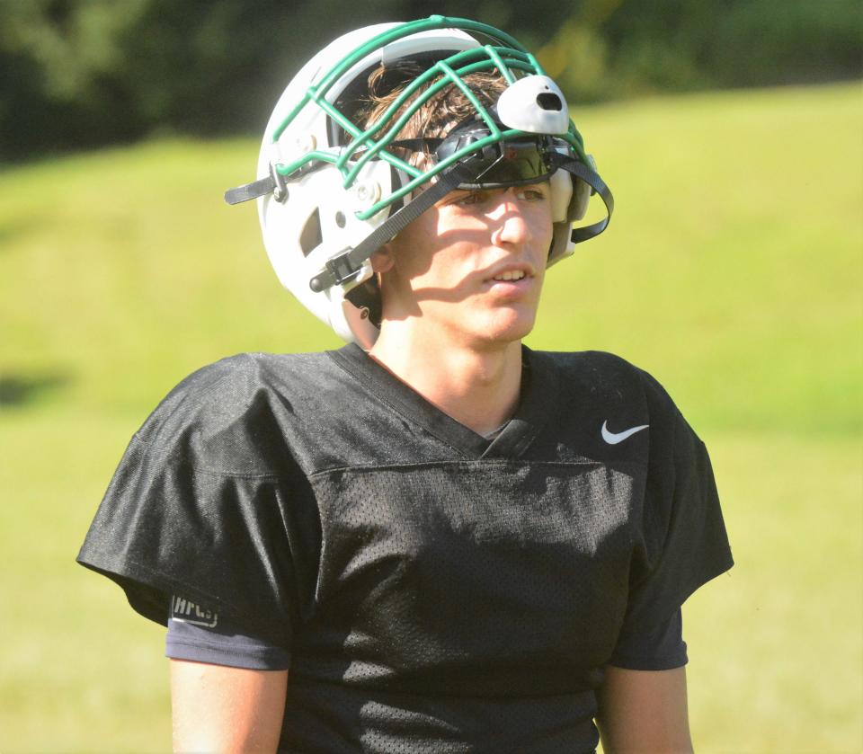Griswold-Wheeler senior Kin Kade Rubino takes a breather during practice at Griswold High School.