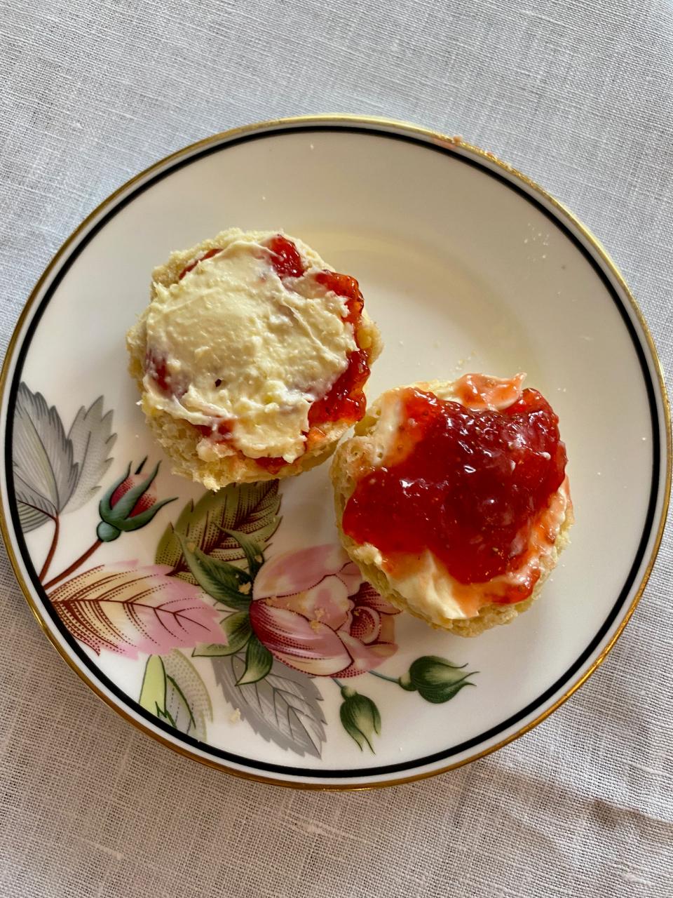 Scones with jam then cream and then cream with jam