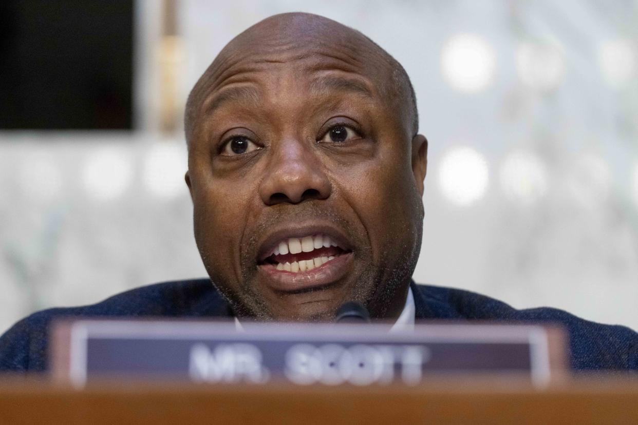 FILE - Ranking Member Sen. Tim Scott, R-S.C., speaks as Federal Reserve Chairman Jerome Powell testifies during a Senate Banking Committee hearing on Capitol Hill in Washington, March 7, 2023. Scott, a likely Republican 2024 presidential prospect, celebrated the Supreme Court's Roe reversal last summer with his party. Last fall, he headlined a gala for Susan B. Anthony Pro-Life America, which is fighting for a federal ban. (AP Photo/Andrew Harnik, File)