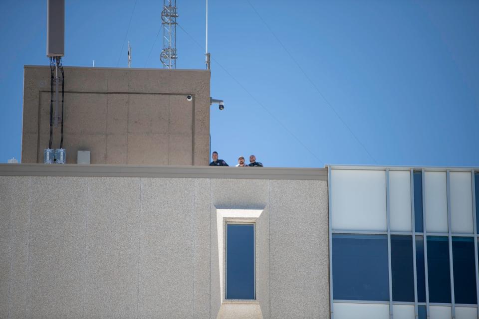 Pueblo Sheriff's Deputies keep eyes on a pro-Palestinian rally from the top of the library on the campus of Colorado State University Pueblo on Tuesday, April 30, 2024.