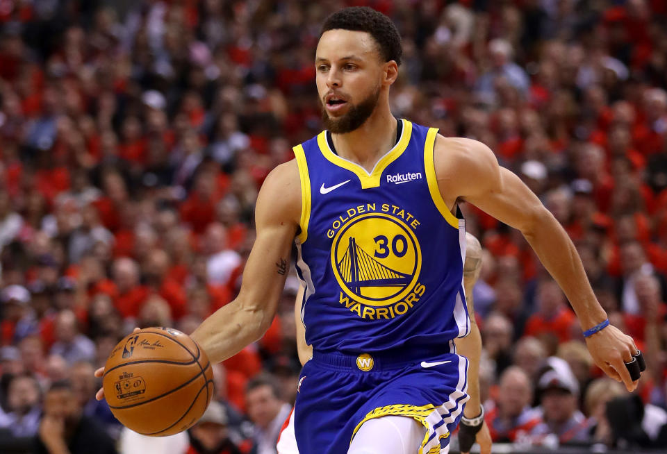 TORONTO, ONTARIO - JUNE 10:  Stephen Curry #30 of the Golden State Warriors handles the ball on offense against the Toronto Raptors in the first half during Game Five of the 2019 NBA Finals at Scotiabank Arena on June 10, 2019 in Toronto, Canada. NOTE TO USER: User expressly acknowledges and agrees that, by downloading and or using this photograph, User is consenting to the terms and conditions of the Getty Images License Agreement. (Photo by Gregory Shamus/Getty Images)