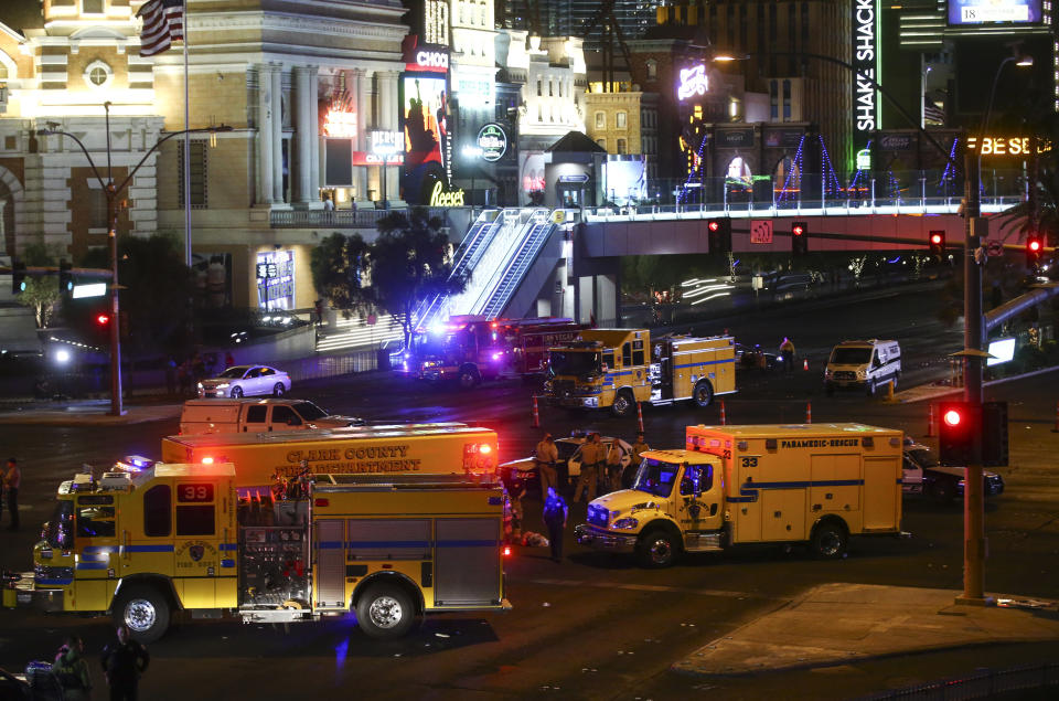 <p>Las Vegas police and emergency vehicles sit on scene following a deadly shooting at a music festival on the Las Vegas Strip early Oct. 2, 2017. (Photo: Chase Stevens/Las Vegas Review-Journal via AP) </p>