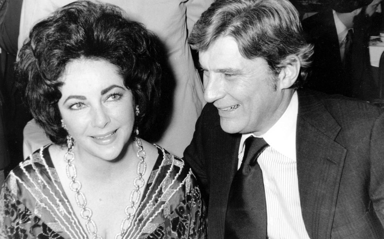John Warner with Elizabeth Taylor in 1977 - AP