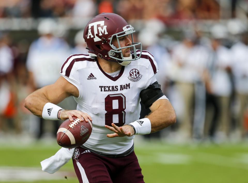 Trevor Knight said he'll play in the Texas Bowl despite a November shoulder injury. (Getty)