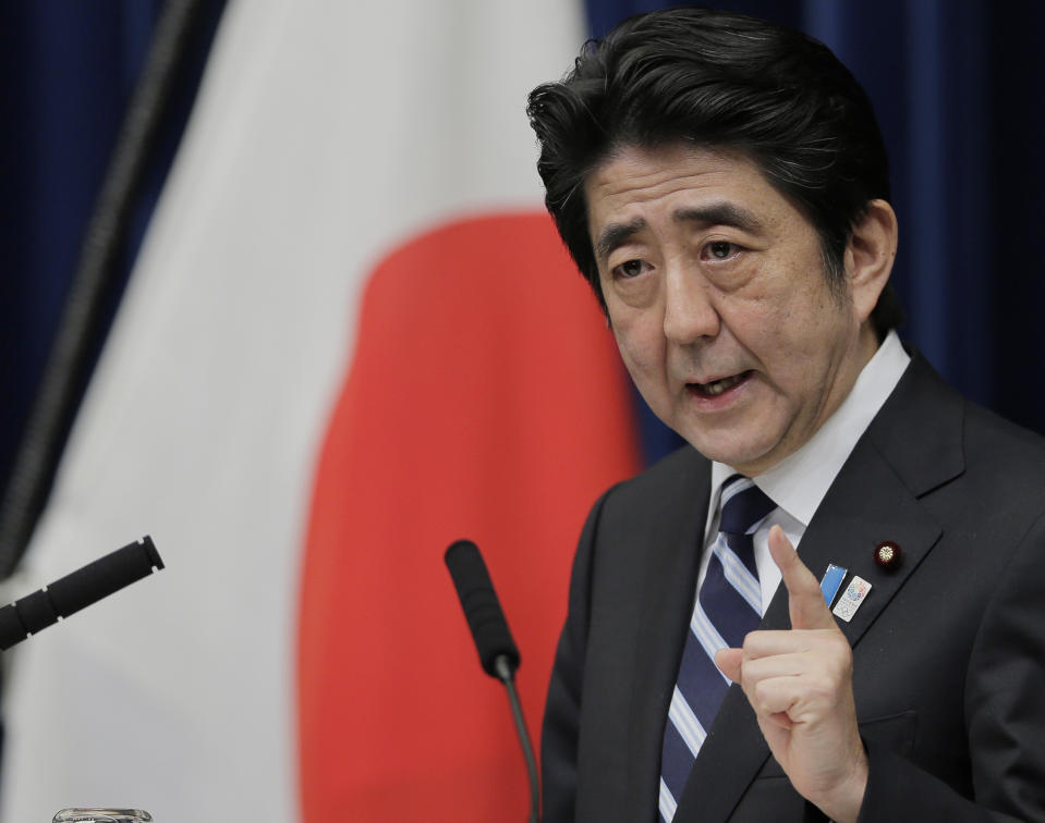 FILE - Then Japanese Prime Minister Shinzo Abe speaks during a news conference on Trans-Pacific Partnership or TPP at his official residence in Tokyo, Friday, March 15, 2013. Former Japanese Prime Minister Abe, a divisive arch-conservative and one of his nation's most powerful and influential figures, has died after being shot during a campaign speech Friday, July 8, 2022, in western Japan, hospital officials said. (AP Photo/Itsuo Inouye, File)