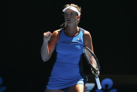 Tennis - Australian Open - Melbourne Park, Melbourne, Australia - 24/1/17 Coco Vandeweghe of the U.S. celebrates winning her Women's singles quarter-final match against Spain's Garbine Muguruza. REUTERS/Issei Kato