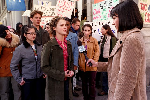 <p>Touchstone Television/Courtesy Everett Collection</p> Keiko Agena (left), Chris Martin and Keri Russell (center) in 'Felicity'