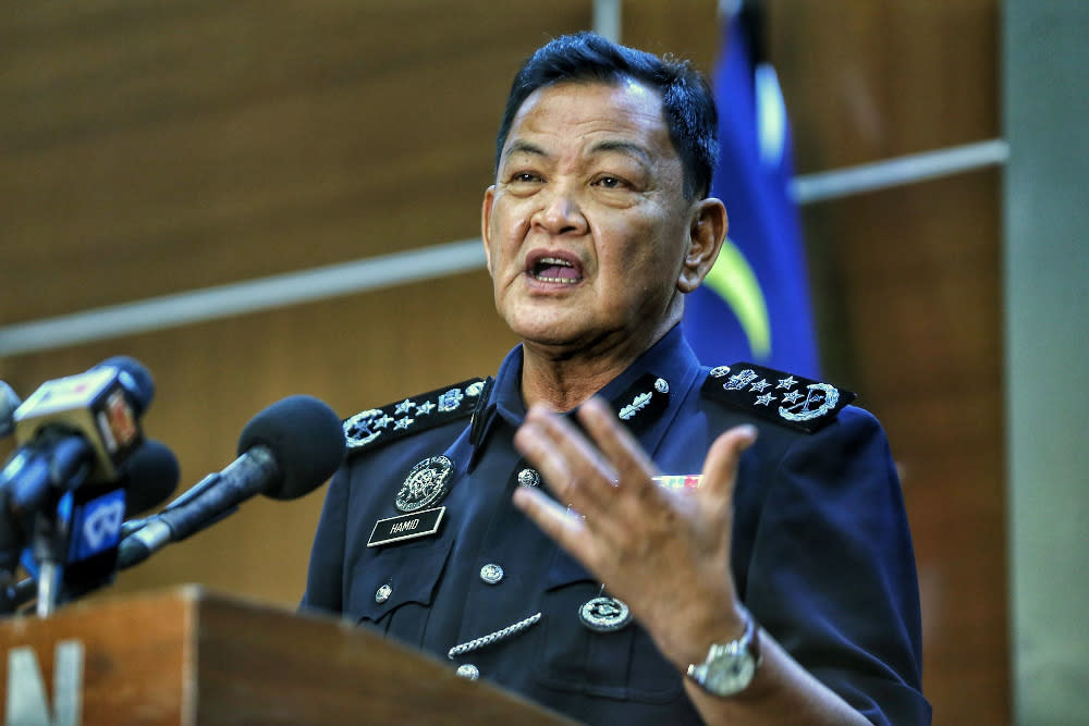 Outgoing Inspector-General of Police Tan Sri Abdul Hamid Bador speaks at his last press conference in Bukit Aman, April 30, 2021. — Picture by Ahmad Zamzahuri