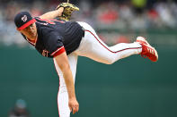 Washington Nationals pitcher Mitchell Parker throws during the first inning of a baseball game against the Houston Astros at Nationals Park, Sunday, April 21, 2024, in Washington. (AP Photo/John McDonnell)