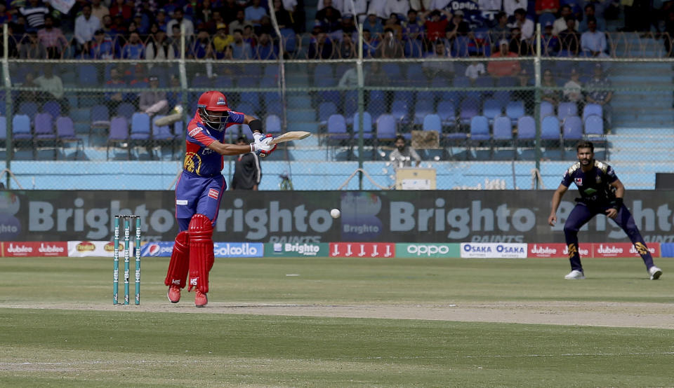 Karachi Kings batsman Babar Azam plays a shot during the Pakistan Super League T20 cricket match against Quetta Gladiators at National Stadium in Karachi, Pakistan, Sunday, Feb. 23, 2020. (AP Photo/Fareed Khan)