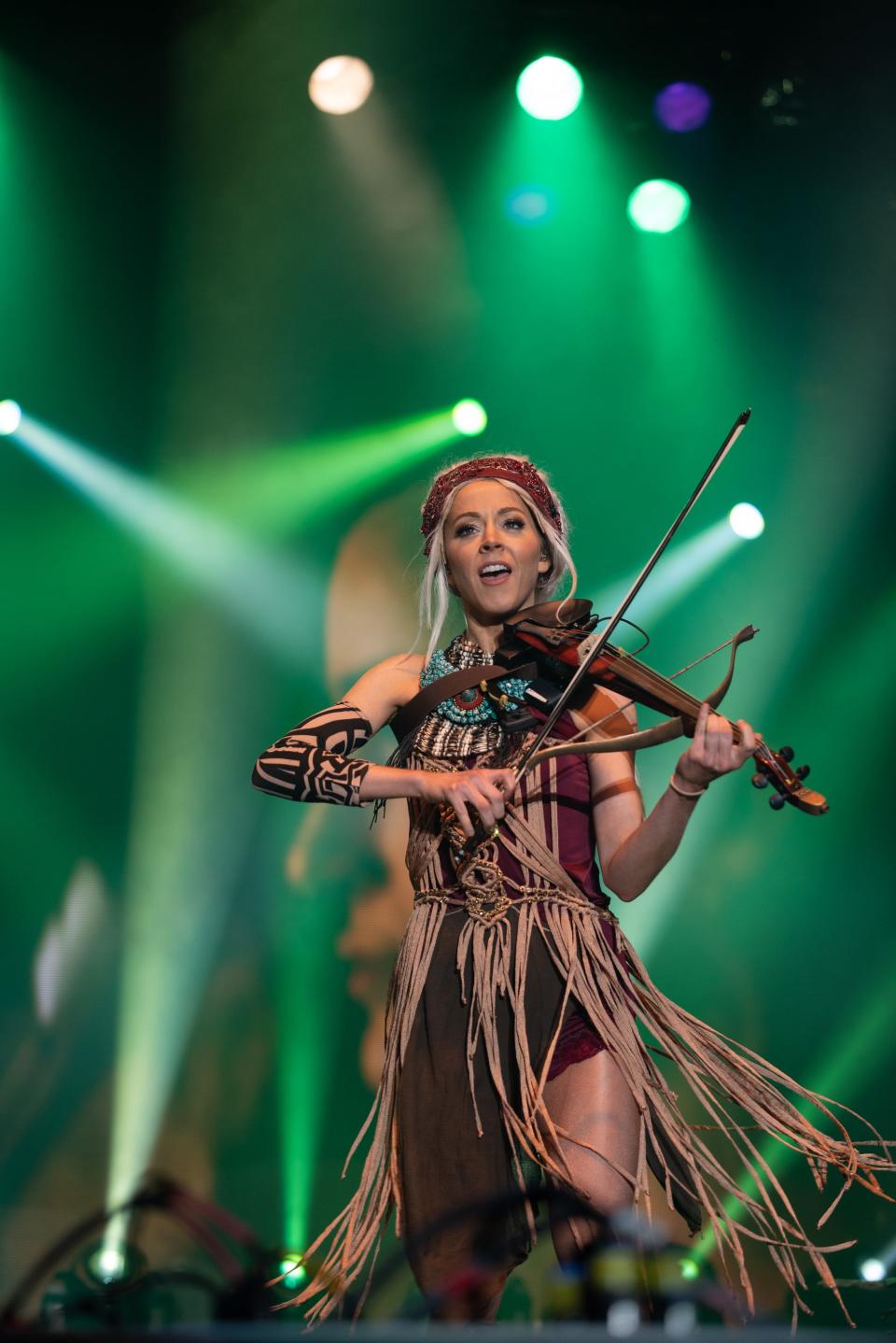 Lindsey Stirling plays PNC Pavilion on Thursday.