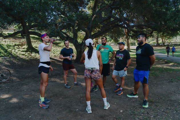 The team congregates for snacks and socializing after their run at Griffith Park. (Photo: Nolwen Cifuentes for HuffPost)