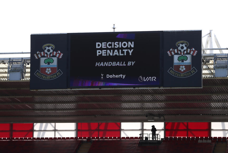 Screen shows the VAR decision to award a penalty after handball by Tottenham Hotspur's Matt Doherty during the Premier League match at St Mary's Stadium, Southampton.