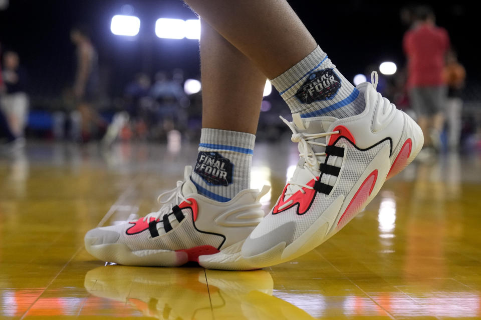 Florida Atlantic forward Giancarlo Rosado walks on the court at practice for their Final Four college basketball game in the NCAA Tournament on Friday, March 31, 2023, in Houston. San Diego State and Florida Atlantic play on Saturday. (AP Photo/David J. Phillip)