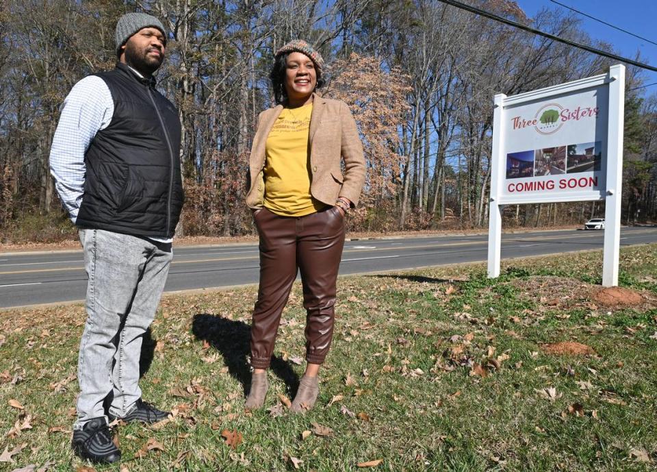 Guy Cousins, board member of West Boulevard Coalition, and Janiqua Jackson, general manager for the coalition’s Three Sisters Market, are at the future site of the co-op grocery store. The West Boulevard corridor has been without a supermarket for 30 years.
