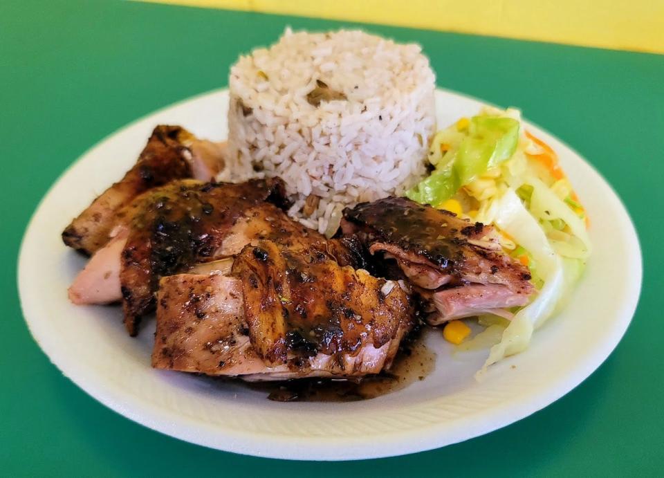 Big Boyz Jamaican Restaurant in Vero Beach features a variety of Caribbean food, including jerk chicken with rice and peas and steamed vegetables.