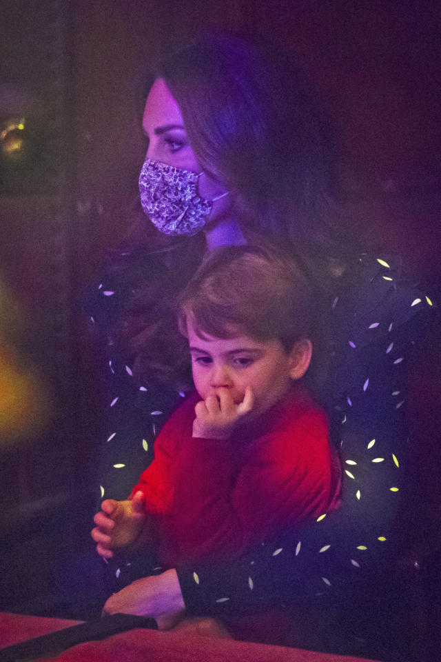Catherine, Duchess of Cambridge and Prince Louis attend a special pantomime performance at London&#39;s Palladium Theatre, hosted by The National Lottery, to thank key workers and their families for their efforts throughout the pandemic on December 11, 2020 in London, England. (Photo by  Aaron Chown - WPA Pool/Getty Images)