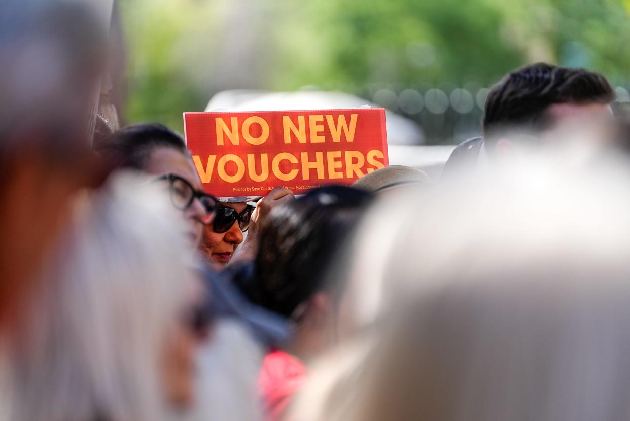 Jana Lynn Granillo attends a press conference protesting the lack of limits on Arizona's universal voucher program at the Arizona Capitol in Phoenix on May 9, 2023.