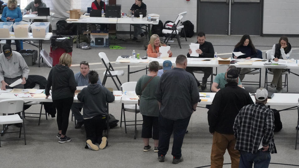 People gather at the Norfolk Southern Railways Assistance Center 