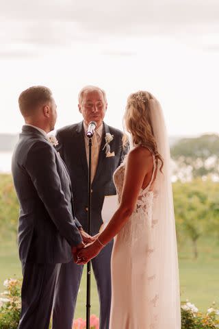 <p>Jordan Arnold Photography</p> Ed Suslovic officiating Chris Costello's wedding.