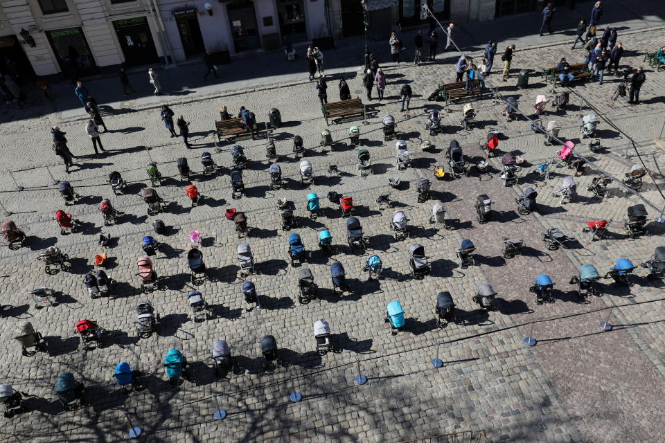 A general view of 109 empty prams placed in the center of Lviv during the 