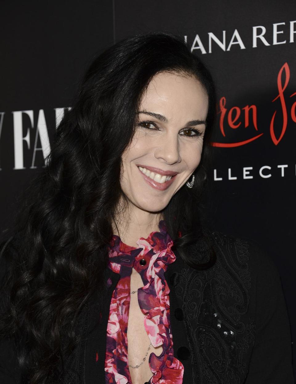 FILE - This Nov. 19, 2013 file photo shows fashion designer L'Wren Scott at the Banana Republic L'Wren Scott Collection launch party at the Chateau Marmont in West Hollywood, Calif. Scott, a fashion designer, was found dead Monday, March 17, 2014, in Manhattan of a possible suicide. (Photo by Dan Steinberg/Invision/AP, File)