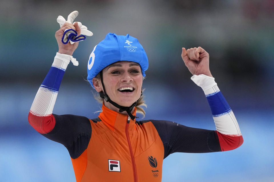 Irene Schouten of the Netherlands reacts after winning the gold medal in the women's speedskating mass start finals at the 2022 Winter Olympics, Saturday, Feb. 19, 2022, in Beijing. (AP Photo/Sue Ogrocki)